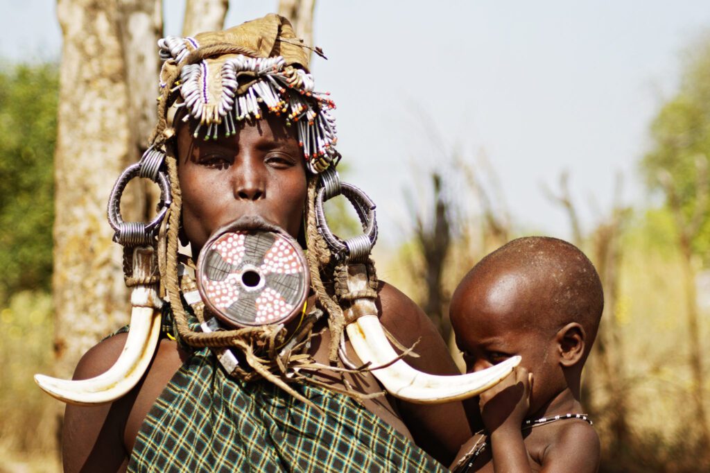 Mursi Tribe – The Larger the Lip Plate, the Bigger the Bride Wealth Mursi Tribe – The Larger the Lip Plate, the Bigger the Bride Wealth